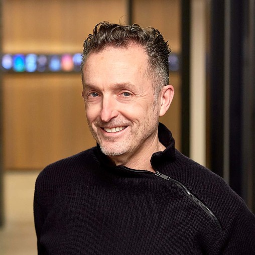 A man smiling for the camera.