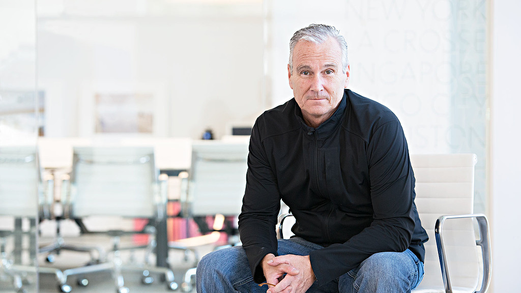 A man sitting in a chair.