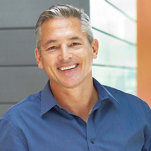A man smiling for the camera.