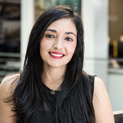 A woman with long black hair.