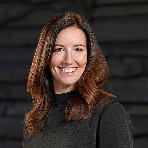 A woman smiling for the camera.