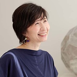 A person smiling for the camera.