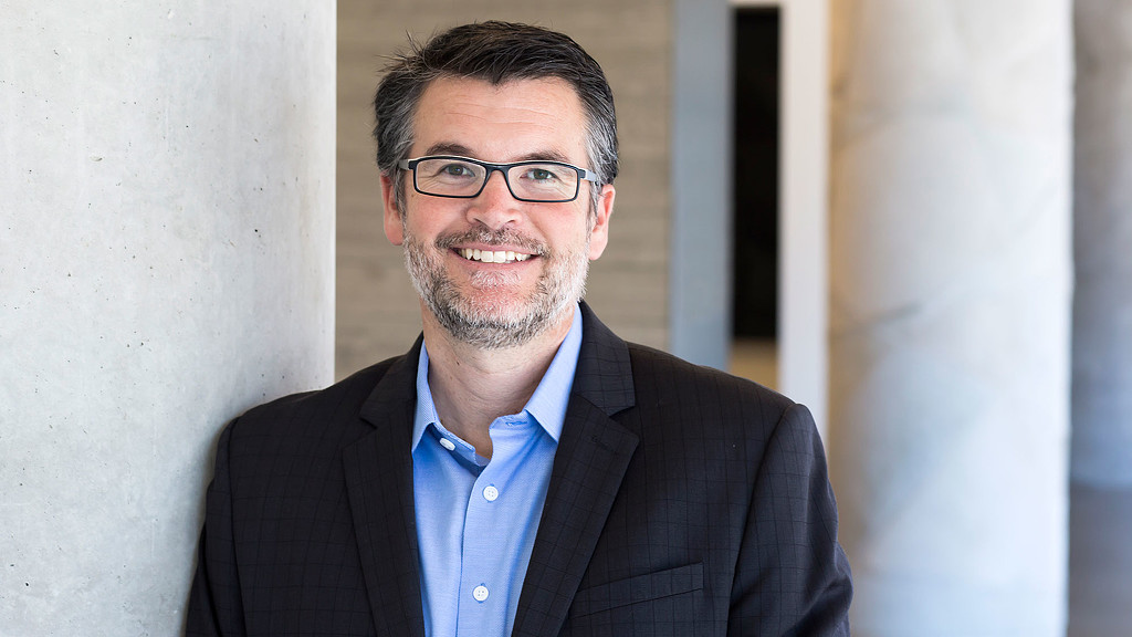A man wearing glasses.