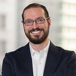 A man wearing glasses.