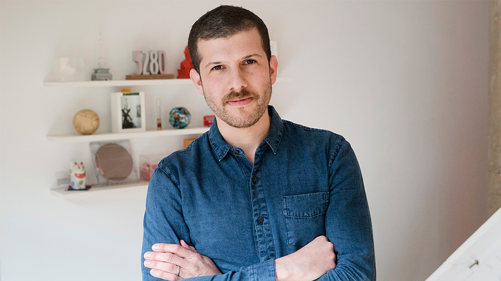 A man with his arms crossed.
