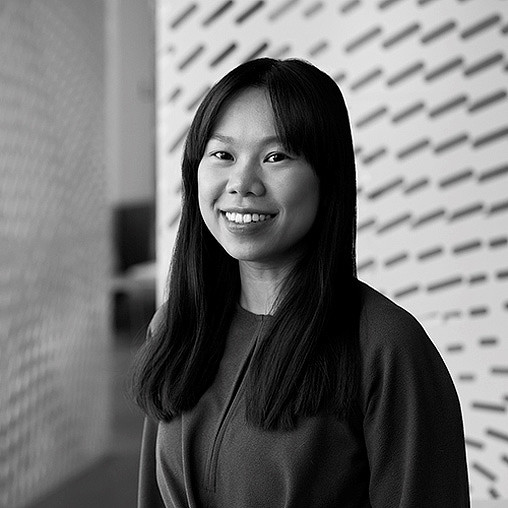 A woman smiling for the camera.