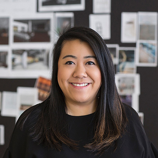 A woman smiling for the camera.