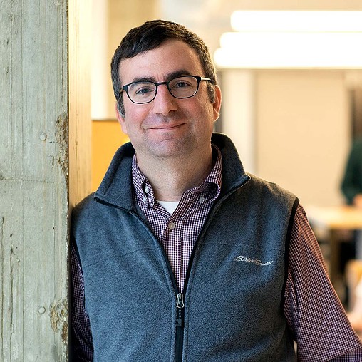 A man wearing glasses.