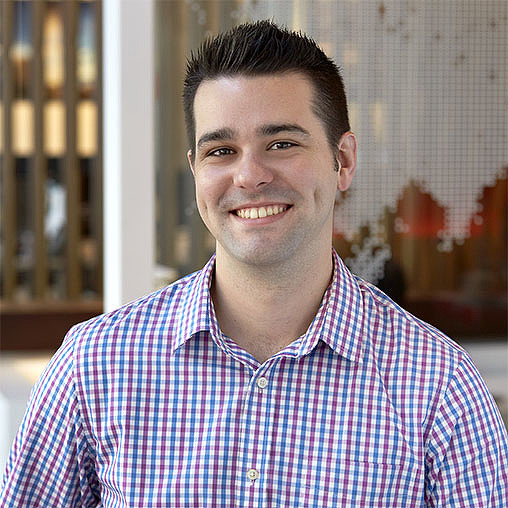 A man smiling for the camera.