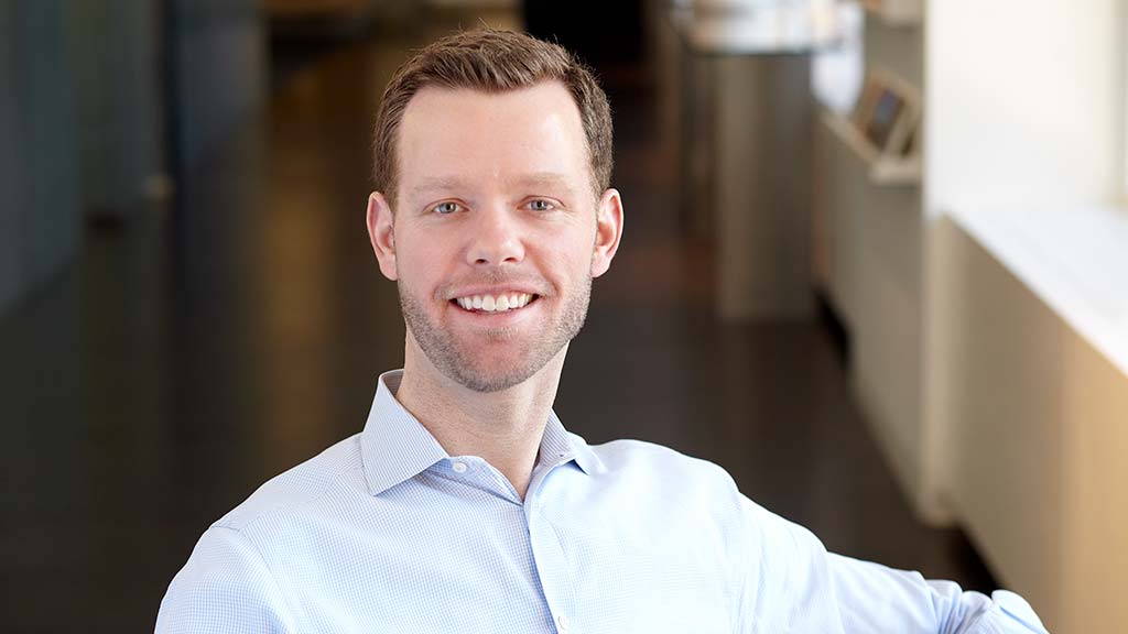 A man smiling for the camera.