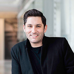 A man smiling for the camera.