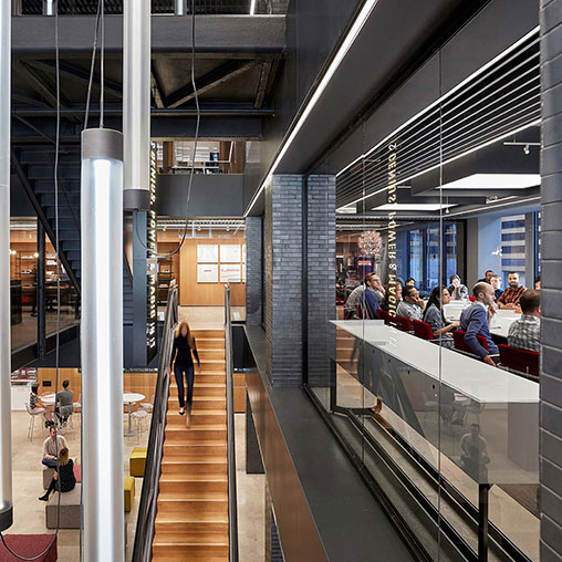 A group of people in a building.