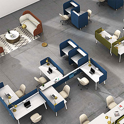 An office with a lot of desks and chairs.