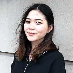 A woman with long hair.