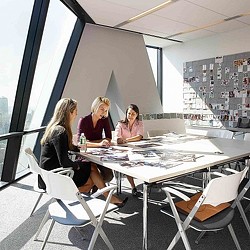 A group of women sitting at a table.
