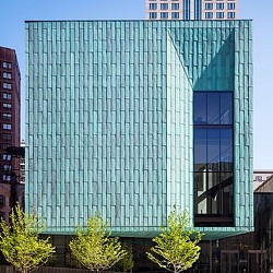 A tall building with many windows.