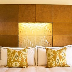 A bed with white pillows.