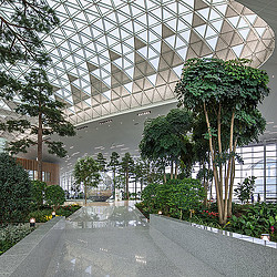 A building with trees and plants.