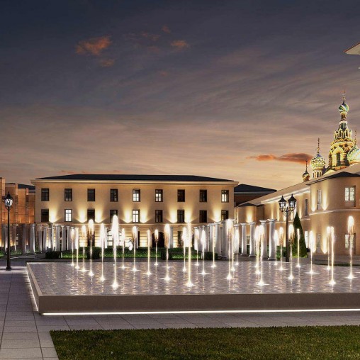 A fountain in front of a building.