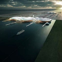 An airplane wing with a few planes on it.