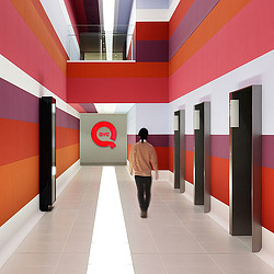 A person walking in a hallway.