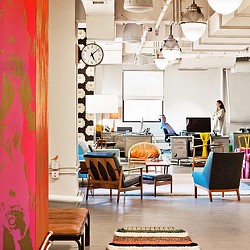 A room with chairs and tables.