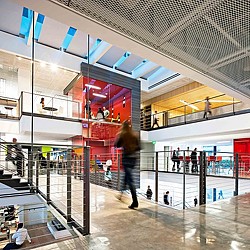 A person walking in a large building.