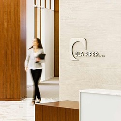 A person walking in a hallway.