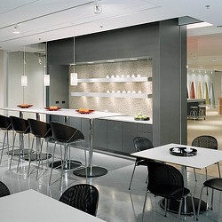 A room with tables and chairs.