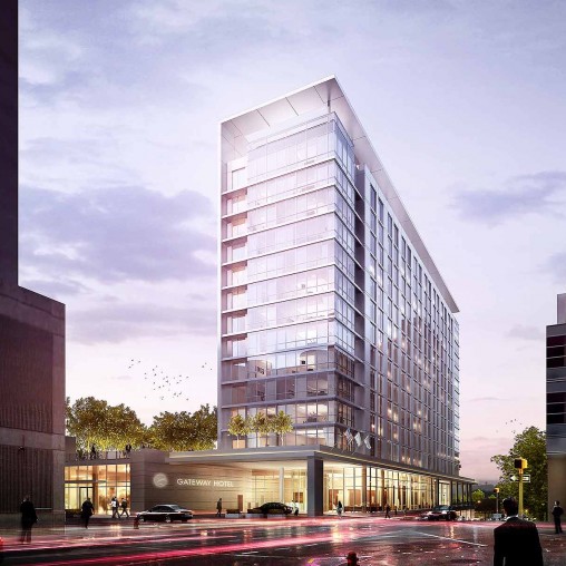 A tall building with a glass front.