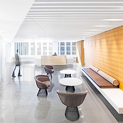 A room with a table and chairs.