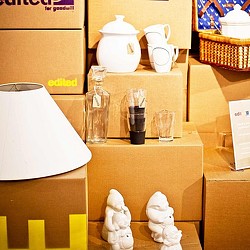 A table with a glass and a glass of liquid on it.