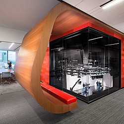 A large orange object with a glass window.