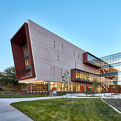 A building with a lawn in front of it.