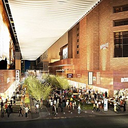 A group of people outside a building.