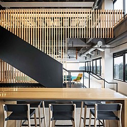 A room with tables and chairs.