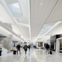 A group of people in an airport.