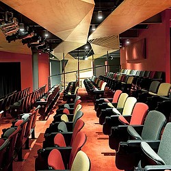 A room with rows of chairs.