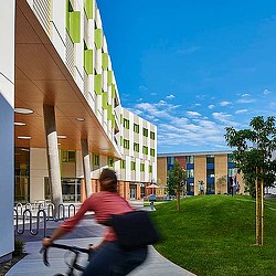 A man riding a bicycle.