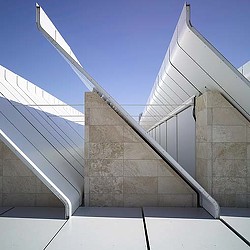 A white bridge with a curved top.