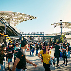 Fans walking outside Banc of California stadium.
