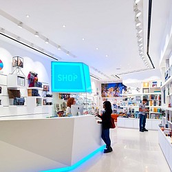 A woman and a man in a store.