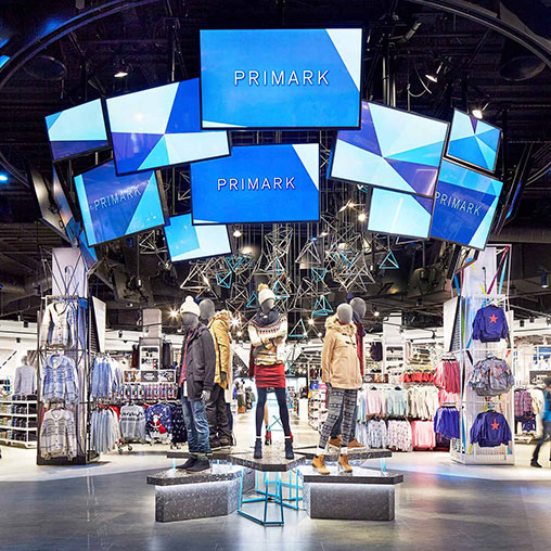 A group of people in a store.