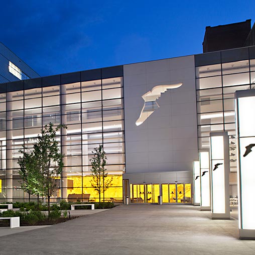 A building with a large glass front.