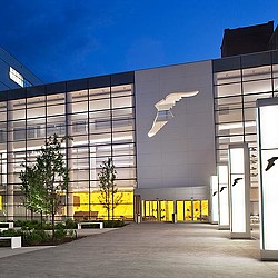 A building with a large glass front.