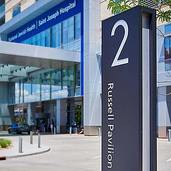 A sign in front of a building.