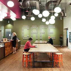 A group of people in a restaurant.