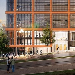 A building with people walking around.