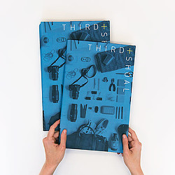 A person drawing on a white board.