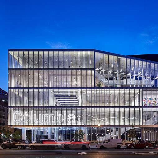 A large building with glass windows.